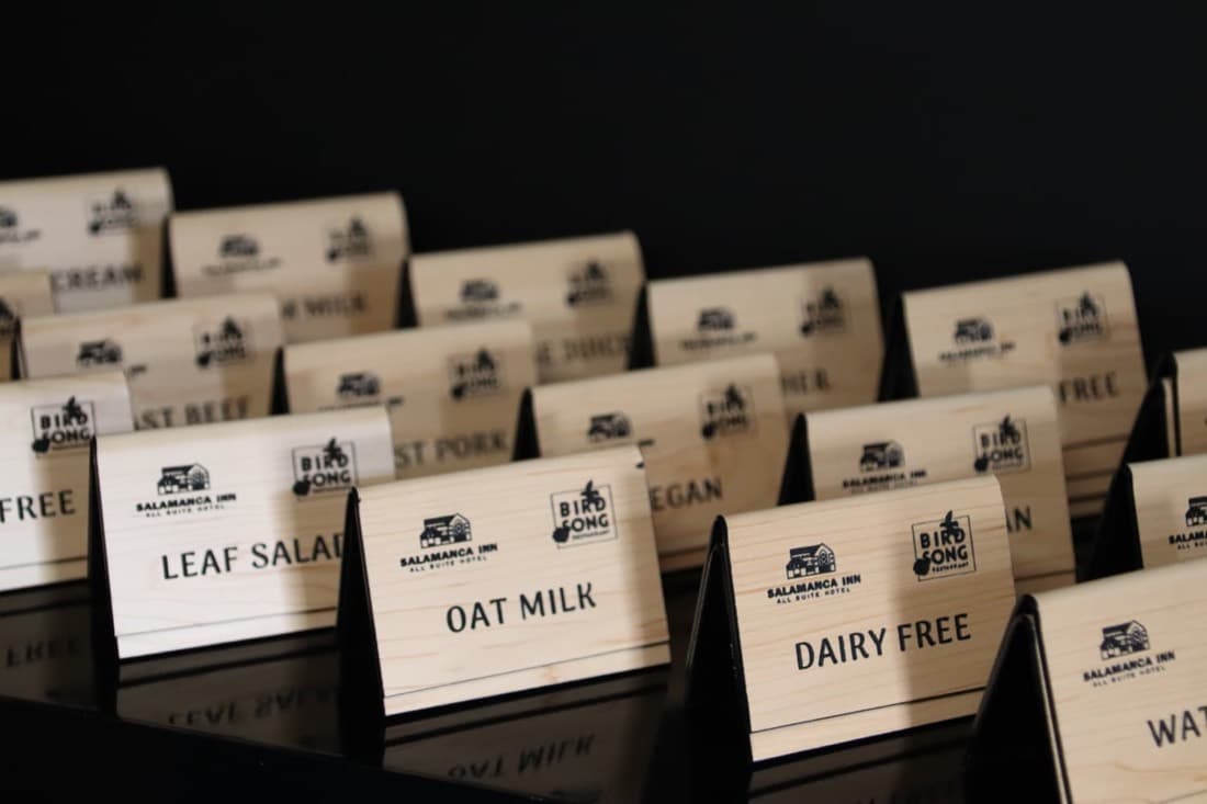 Engraved restaurant dietary table signs including oat milk and dairy free