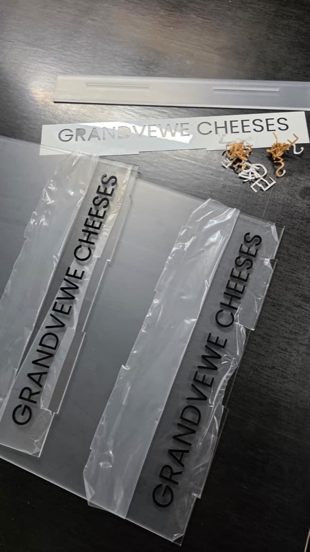 Laser-engraved timber QR-code menu stand for a cafe counter