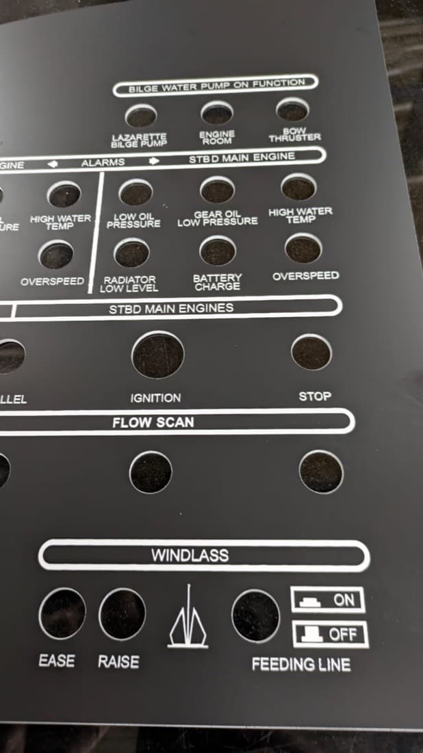 Large engraved acrylic marine instrument panel with engine alarm and bilge pump labels