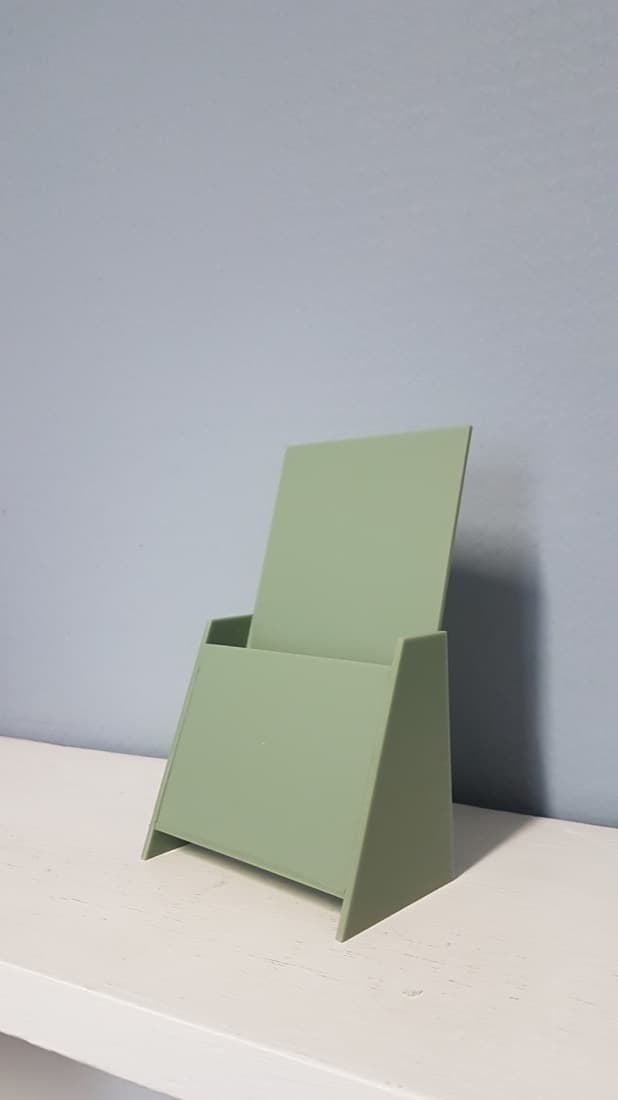 Green acrylic literature and brochure holder fabricated for a healthcare setting